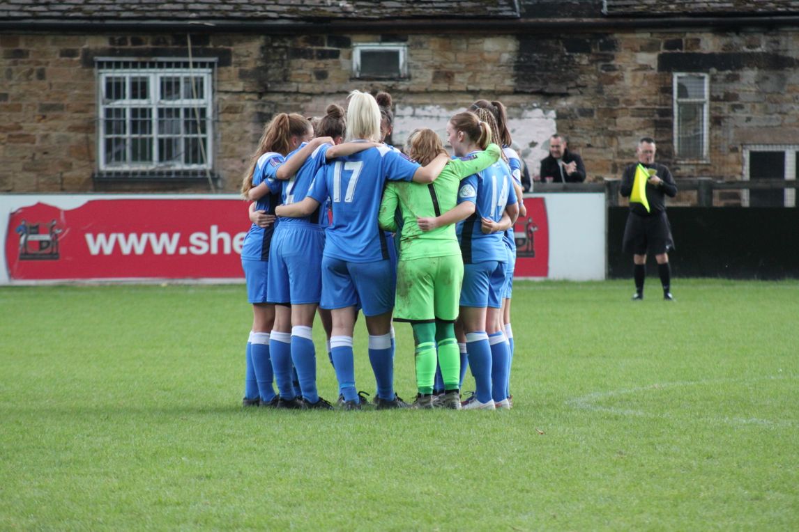 players stood in a huddle